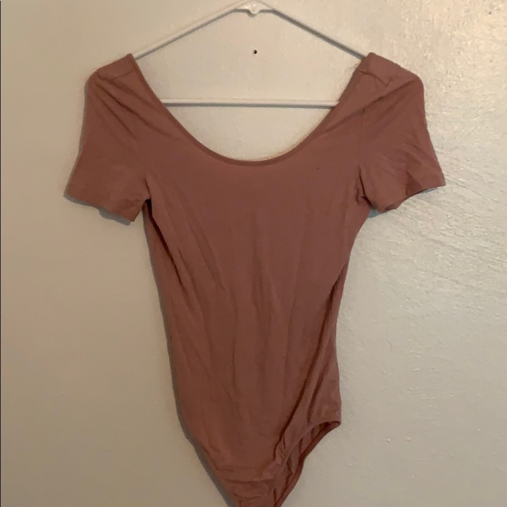 Pink body suit